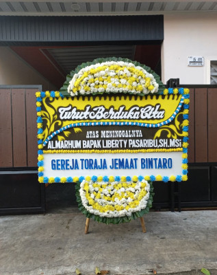 Papan Bunga Duka di Warnajati